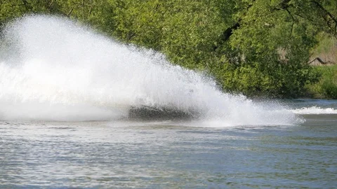 Jet ski on the river. Splashes fly apart. Stock Footage 108746577