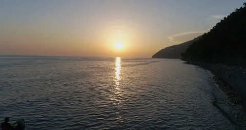 Jet ski is sailing on the sea under sunset. Stock Footage 129609609
