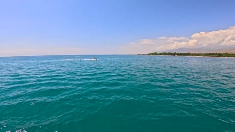 Jet ski sails on the waves 스톡 동영상 282367302