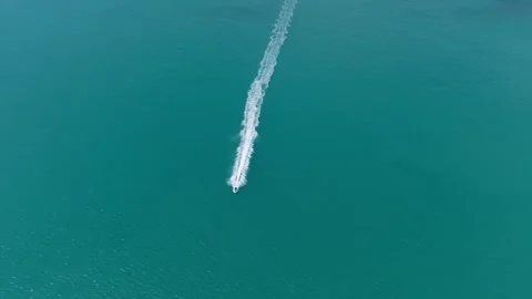 Jet Ski Speeding Across Open Water – Aerial Drone Shot Video stock 329458408