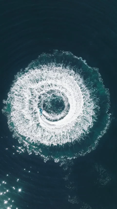 Jet Ski Stunt: Top-Down View of Spiraling Water Trails Stock Footage 275567191
