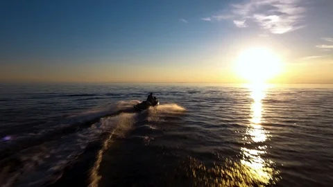 Jet Ski Sunset drone 2 Stock Footage 122456078