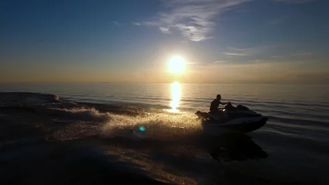 Jet Ski Sunset drone 4 Stock Footage 122456176