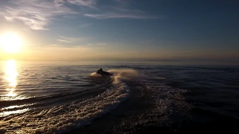 Jet Ski Sunset drone 5 Stock Footage 122456174
