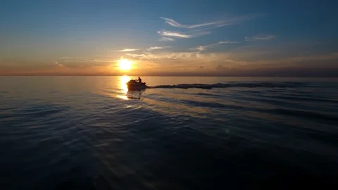Jet Ski Sunset drone 6 Stock Footage 122456247