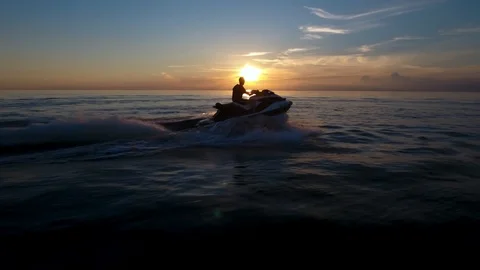 Jet Ski Sunset drone 7 Stock Footage 122456250