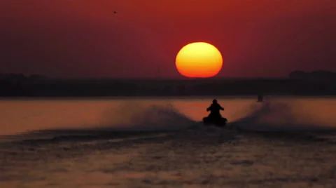 Jet ski sunset HI Stock Footage 32700394