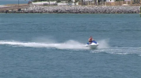 Jet Ski Thru Harbor Stock Footage 5327451