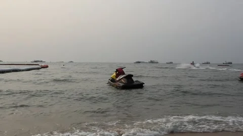 Jet Ski on the waves at Pattaya beach Stock Footage 48533419