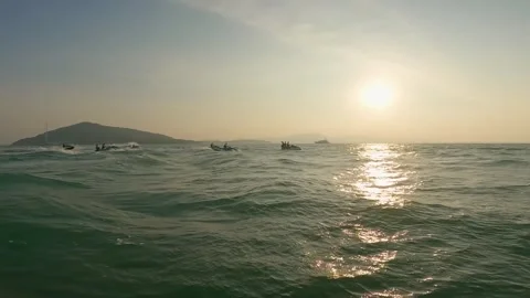 Jet skiing on the sea at sunset Stock Footage 307135454