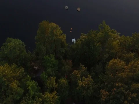 Jet Skiing sunset on lake Stock Footage 77598161