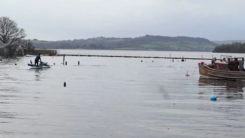 Jet skis setting off onto Lake Stockbeeldmateriaal 229984861