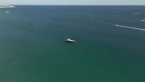 Jet sky riders enjoyed on the Pacific Ocean coast in Mexico Stock Footage 156774218