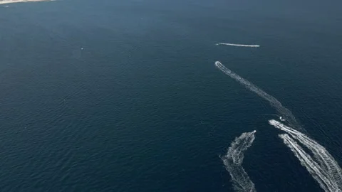 Jet sky riders enjoyed on the Pacific Ocean coast in Mexico Stock Footage 156774338
