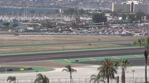 Jet taking off with view of the marina Stock Footage 49760587