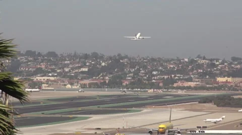Jet taking off with view of the marina Stock Footage 49760703