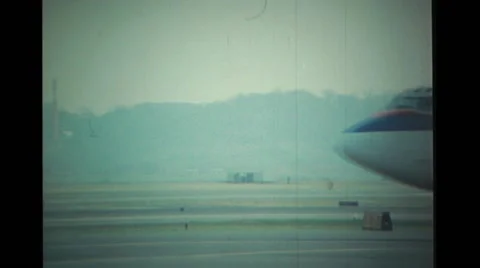 Jet taxiing on runway Stock Footage