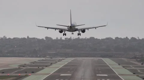 Jet touches down on runway Stock Footage 50122229