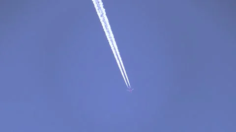 Jet trail realtime zoomed Stock Footage 47675036