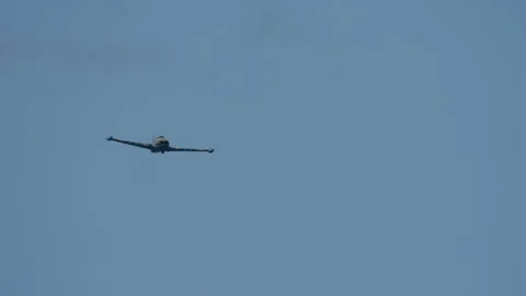 Jet trainer flying directly towards camera Stock Footage 319868587