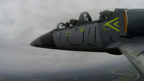 Jet turn against the background of fields and sky. View from left wing close up. Stock Footage 118676918