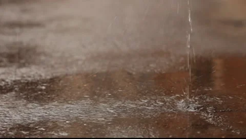 The jet of water falling down the ground with splashes Stock Footage 7728206