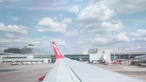 Jet2 Wing View and Air Traffic Control Tower at Manchester Airport Stock Footage 343506842