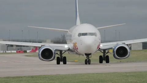 Jet2holidays Boeing 737 going down runway at Manchester airport Stock Footage 263823422