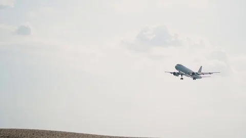 Jetliner Lands Over Beach Stock Footage 85351563