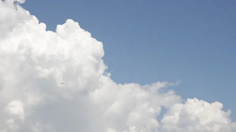 Jetliner leaving clouds distant Video stock 29929713