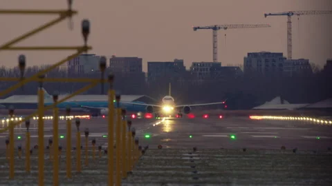 Jetliner Takes Off at Dusk Stock Footage 334420837