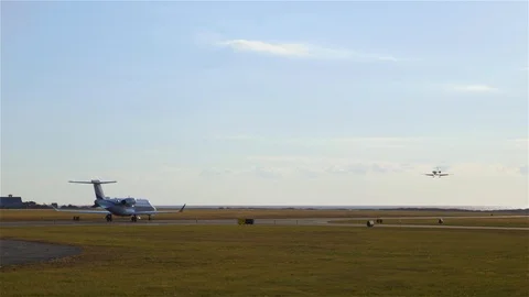 Jet/Plane close up, tracking, Touching Down, during fall, Nantucket Stock Footage 87963893