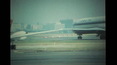 Jets landing and taking off on runway Stock Footage