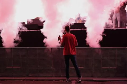 Jets of smoke from the generator as a special effect on the concert stage Stock Photos