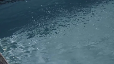 Jets spewing out water in a pool Stock Footage 78808195