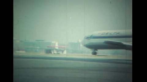 Jets taking off and landing Jets taxiing to and from main terminal Stock Footage