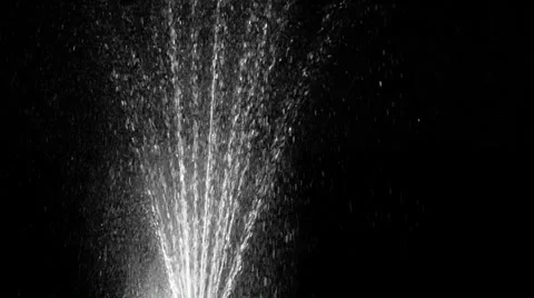 The jets of water on a black background Stock Footage 36072107