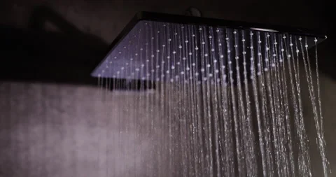 Jets of water pour from a modern diffuser shower system Stock Footage 220020500