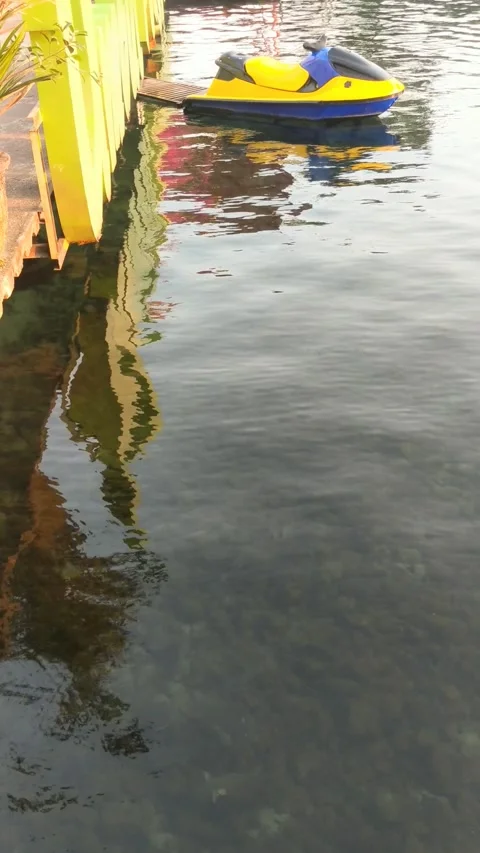 Jetski bobbing over the water of a pool called  Ponggok Video stock 280348620