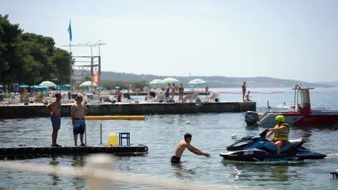 Jetski get back at pier Video stock 111804594