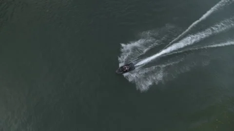 Jetski speeds over the water Stock Footage 323466217