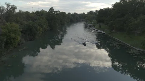 Jetskis at the river in the evening Stock Footage 323463556