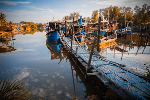 A jetty with boats Stock Photos