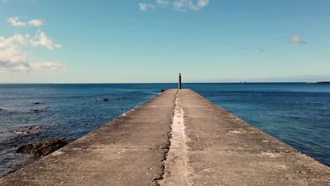 Jetty in front of the sea in a summer day Stock Footage 134405677