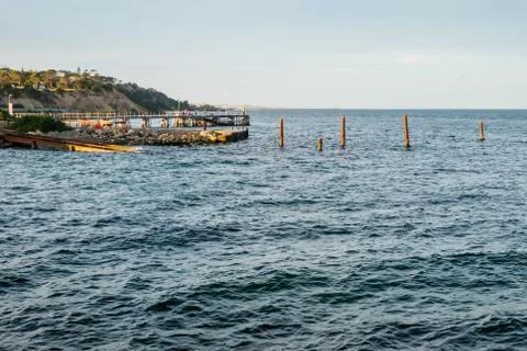 Jetty on the ocean Stock Photos