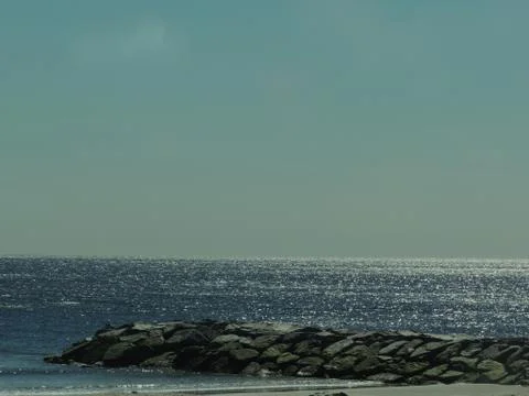 Jetty on the Ocean Stock Photos