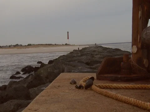 JETTY ROCK WITH LIGHTHOUSE Stock Footage 76610492