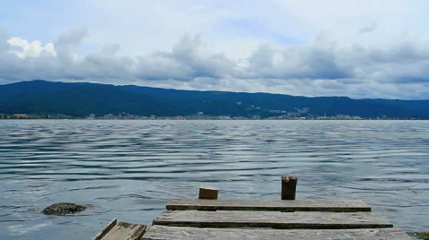 A jetty with the sky and white clouds. Stock Footage 40301482