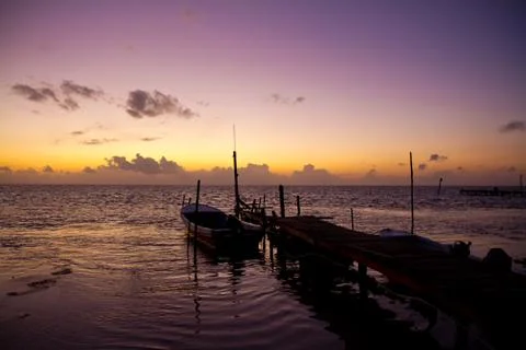 Jetty at sunset Stock Photos