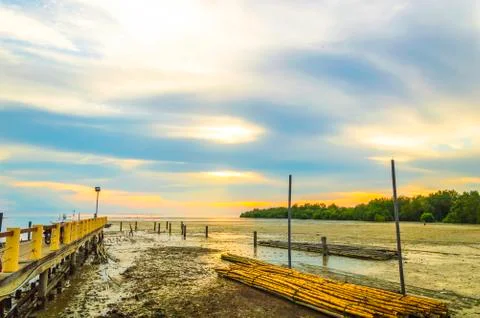 Jetty with sunset Stock Photos